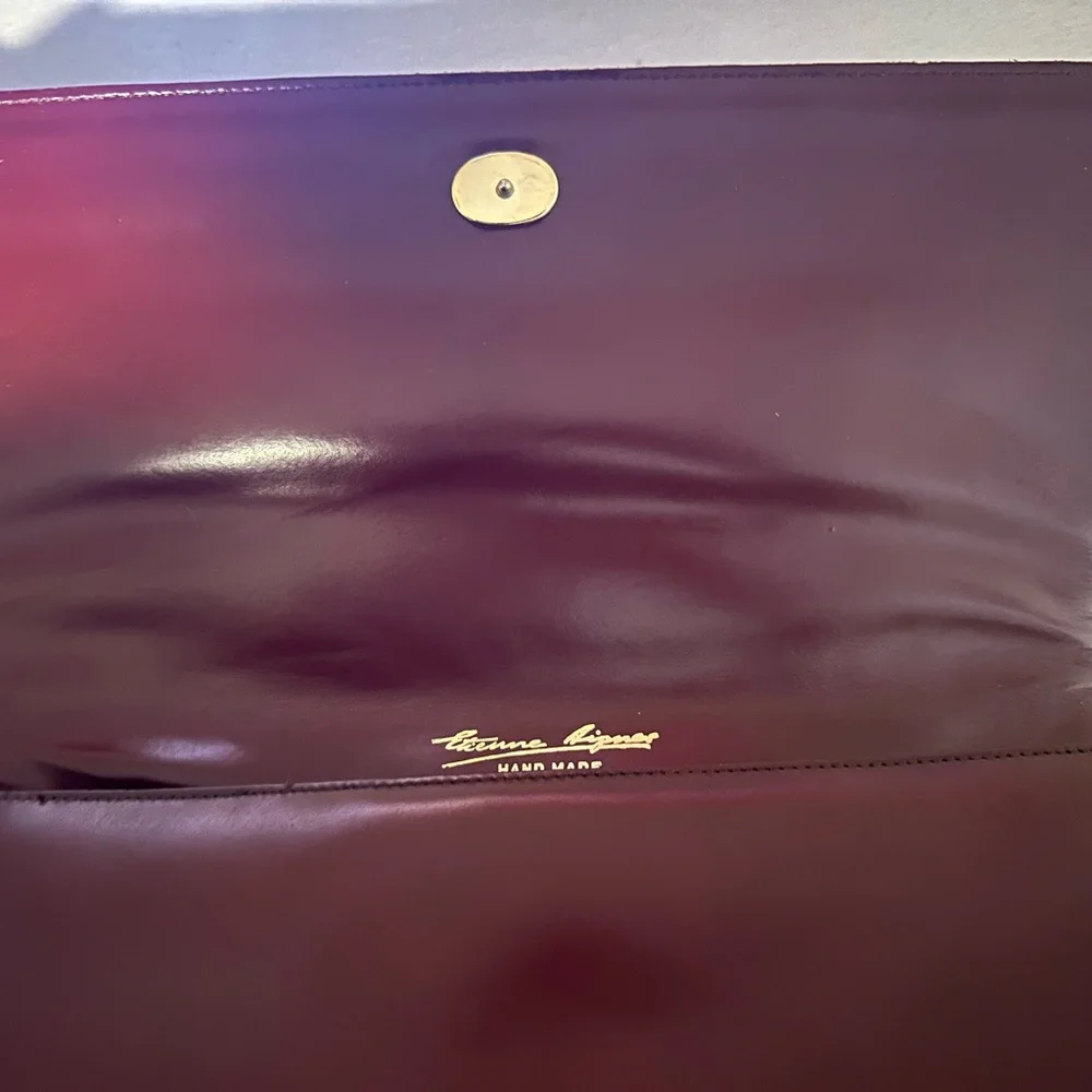 Burgundy Leather Wristlet Clutch with Gold Script Emblem